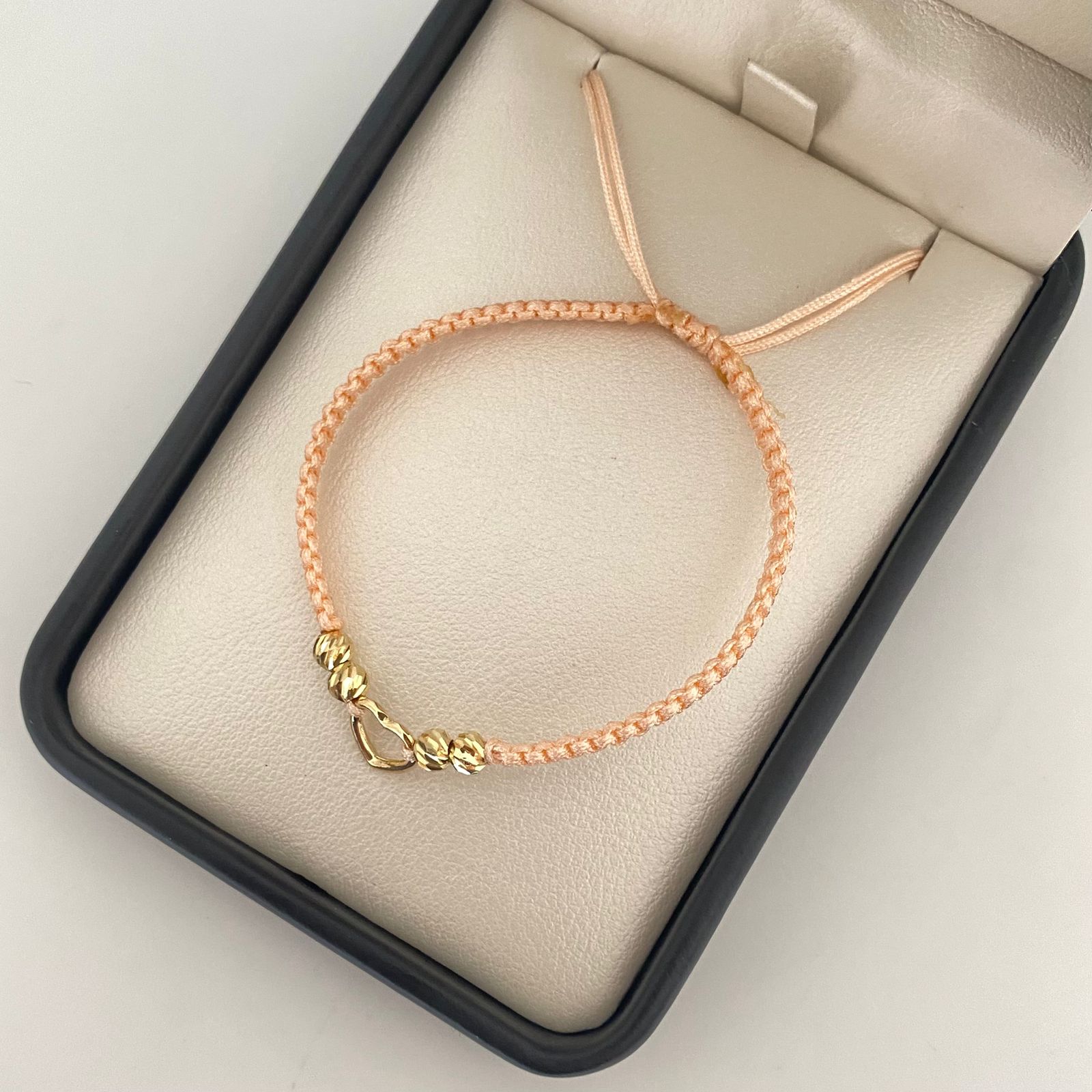 Pulsera tejida herraje silueta corazón balines diamantados #4 Oro amarillo 18k 0,75 Gr